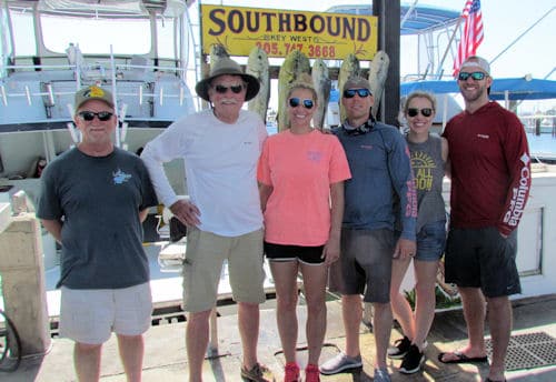 Happy people back from a day Dolphin fishing on the Southbound in Key West Florida