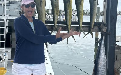 woman with Catch of Mahi and a 36 lb Wahoo