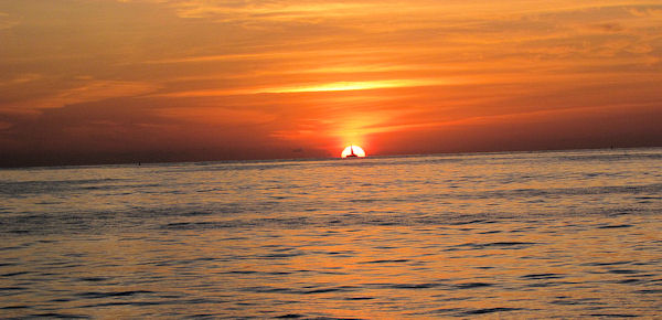 Sunset on the ride home to Key West after fishing on charter boat Southbound