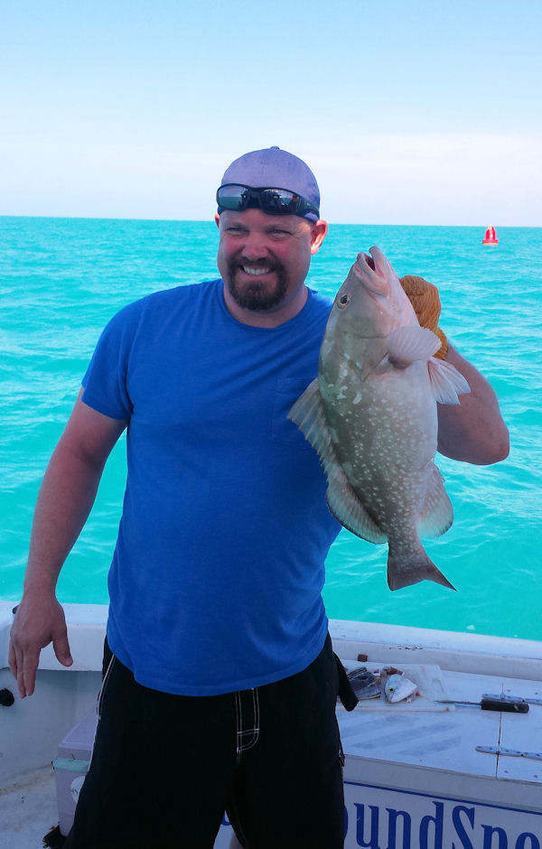 Red Grouper Caught and released along side of the boat in Key West fishing on charter boat Southbound