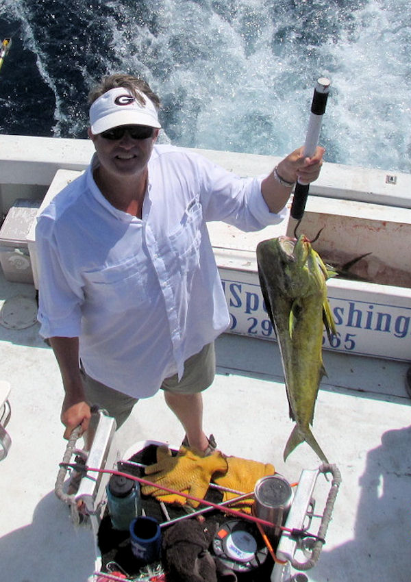 Nice Dolphin in the Gaff in Key West fishing on charter boat Southbound