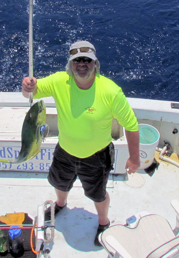 Nice Dolphin in the Gaff in Key West fishing on charter boat Southbound