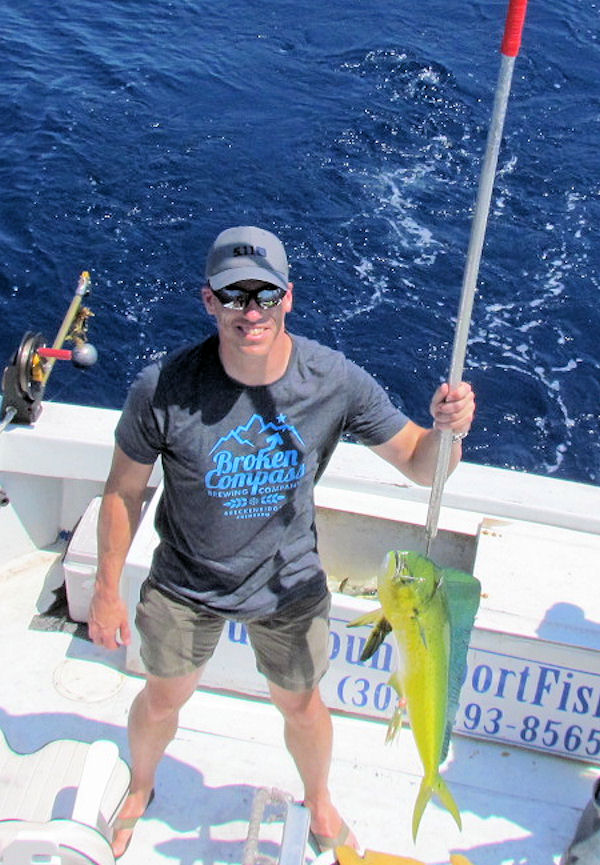 Nice Dolphin in the Gaff in Key West fishing on charter boat Southbound