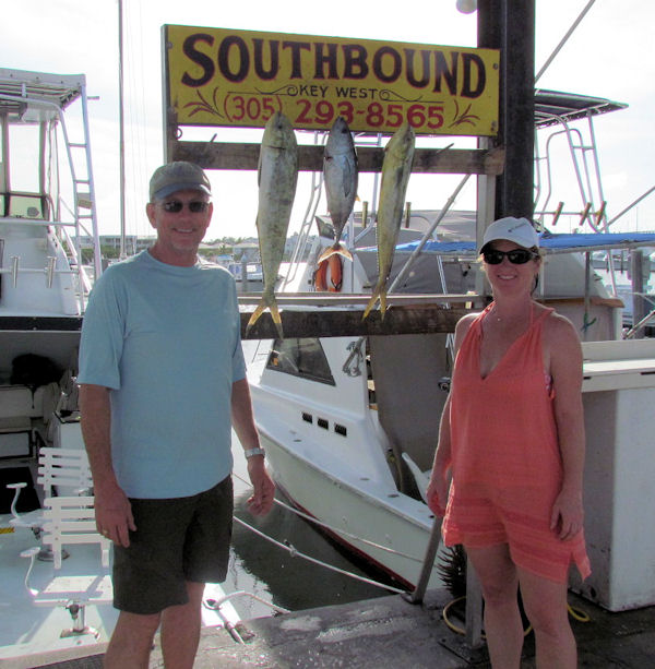 Small dolphin and a black fin tuna caught in Key West fishing on charter boat Southbound