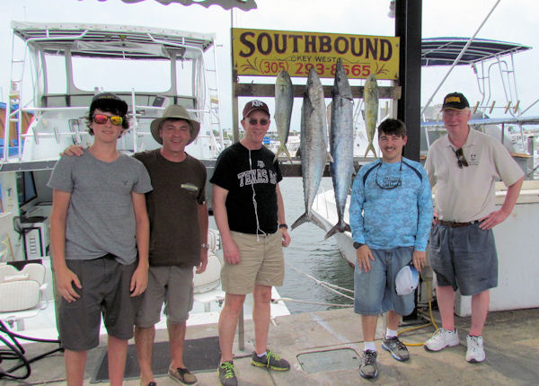Couple big Kingfish and a couple Dolphin caught in Key West fishing on charter boat Southbound