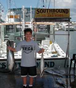 Happy young fisherman in Key West