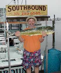 Happy with his dolphin in Key West, Florida