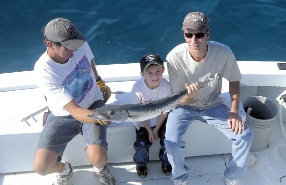 father and son fishing Key West on charter boat Southbound